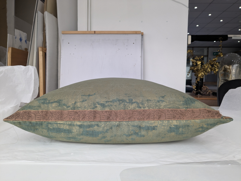 Nymans silk damask cushion during conservation