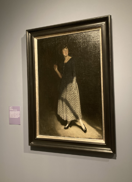 Portrait of a lady in gray hanging in a gallery