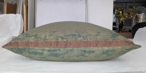 Nymans silk damask cushion during conservation treatment